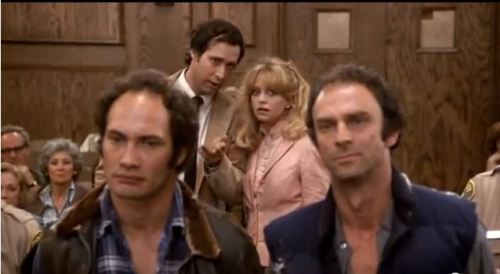 Look at them. They even look like bank robbers.