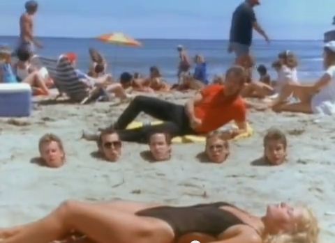 This is what we call the "Cheesecake Huey Lewis Shot," also known as the "Five Heads of The News Shot," also known as the "Any Reason to Show A Tan Because It's the 80s Motherfucker Shot."